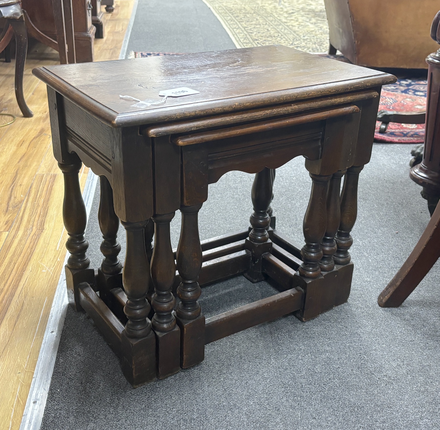 A nest of three 18th century style rectangular oak tea tables stamped CC41, utility furniture, width 49cm, depth 31cm, height 44cm